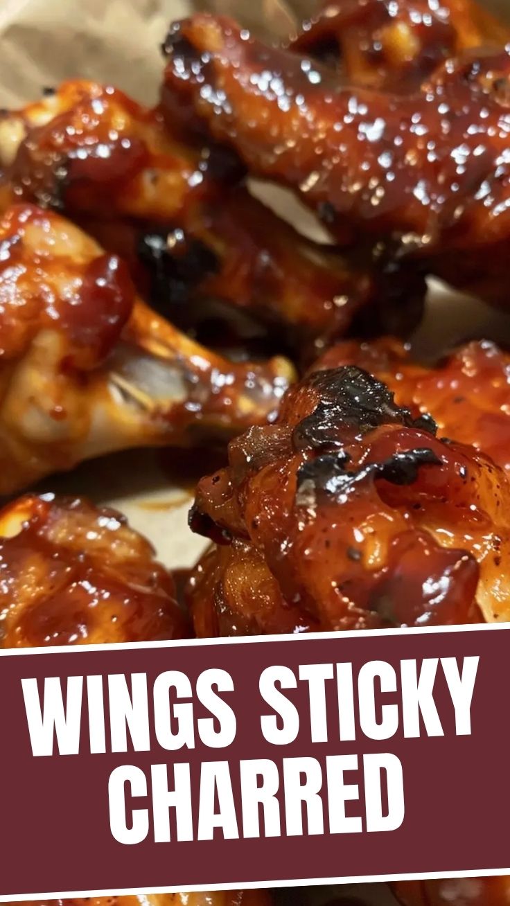 A platter of juicy BBQ chicken wings, perfectly grilled and sauced.