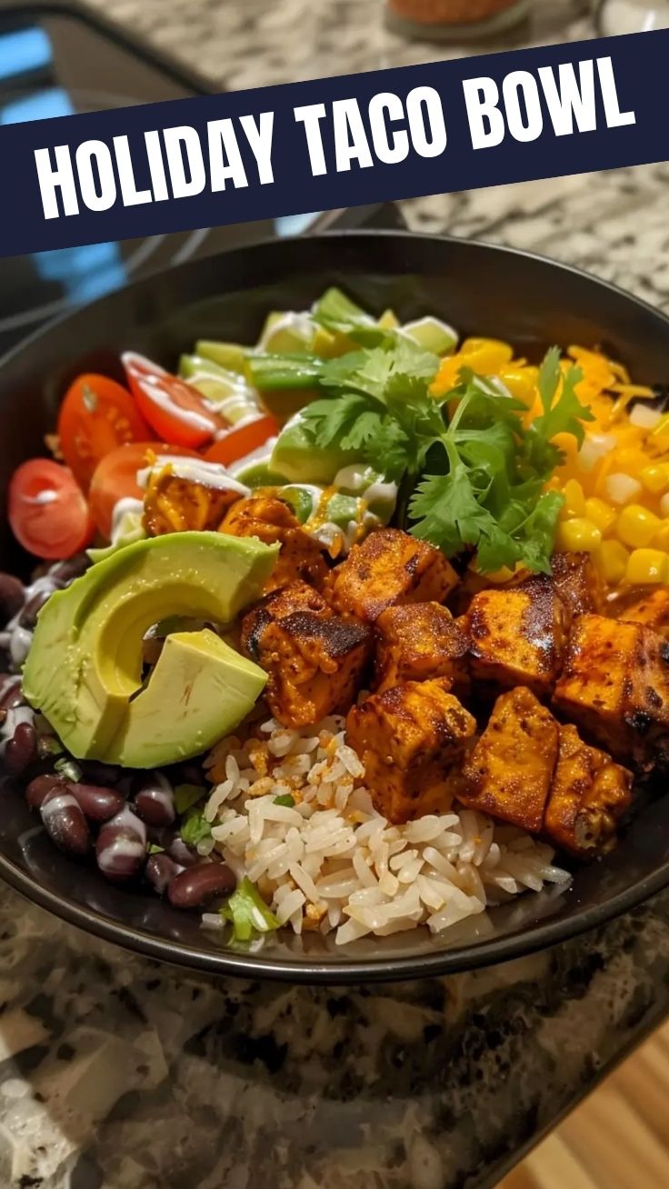 A vibrant taco bowl filled with fresh ingredients like lettuce, corn, and beans.