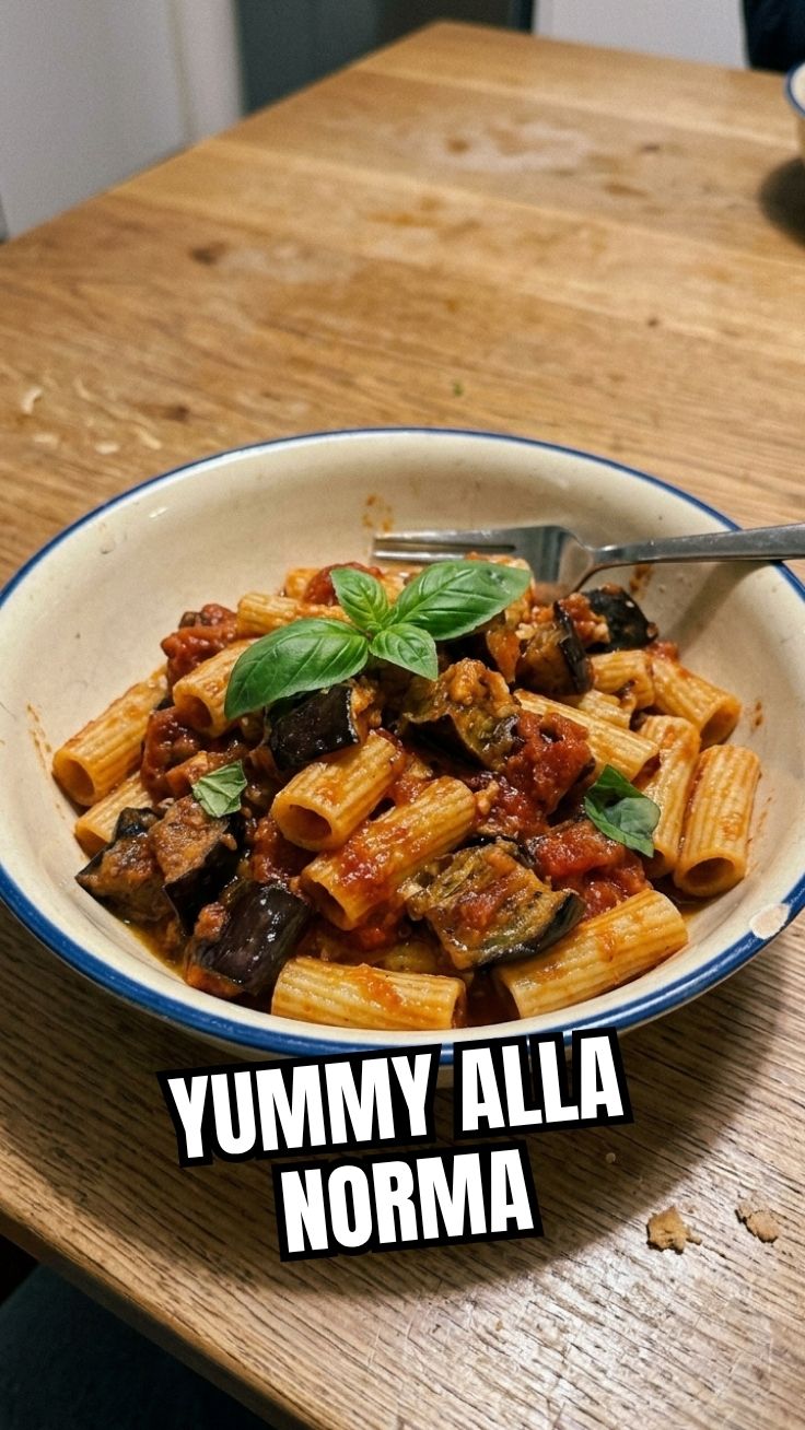 Authentic Pasta alla Norma bowl with eggplant, tomatoes, and ricotta salata