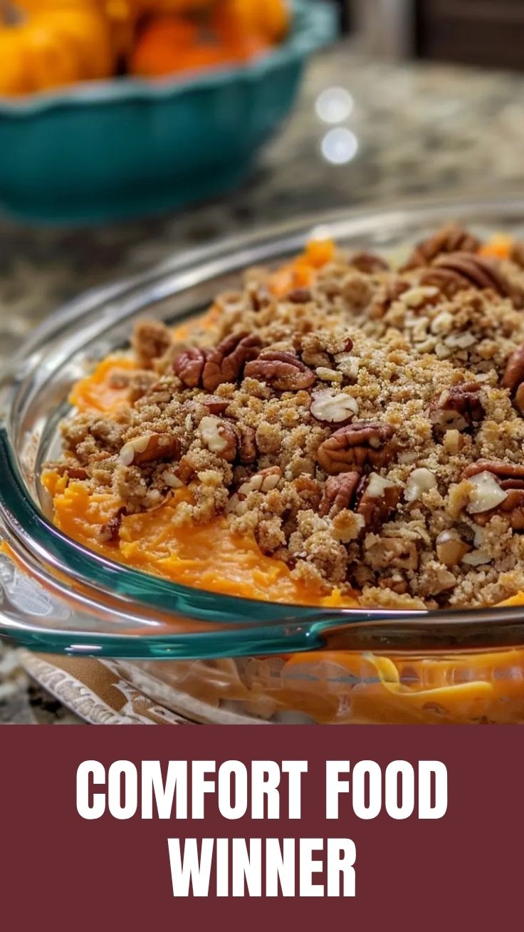 A cozy sweet potato casserole with a golden, toasted marshmallow topping, ready to be served.